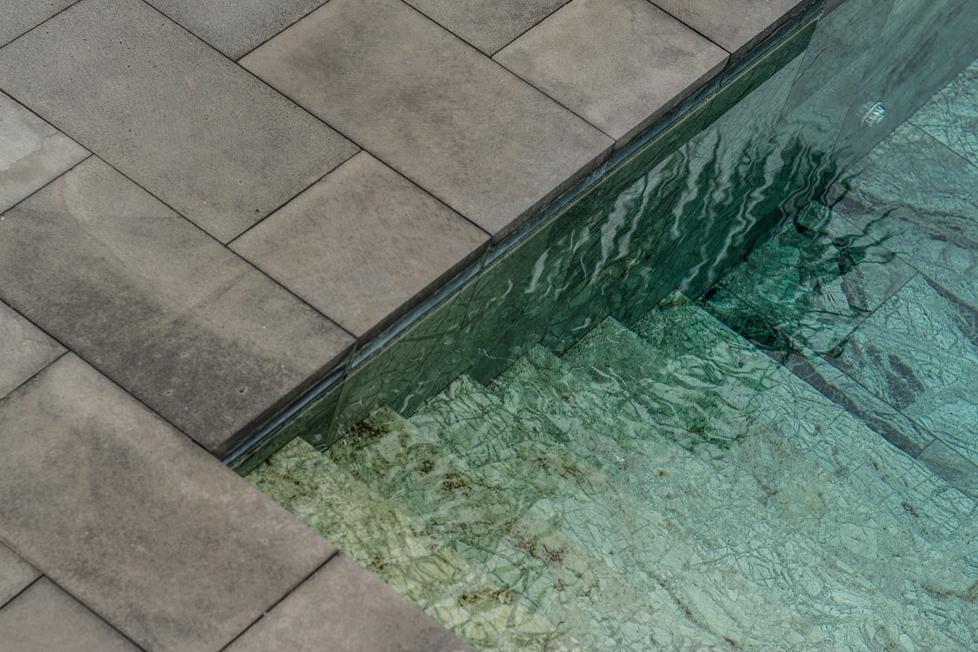 Pool coping paver options in Largo with bullnose and tumbled finishes
